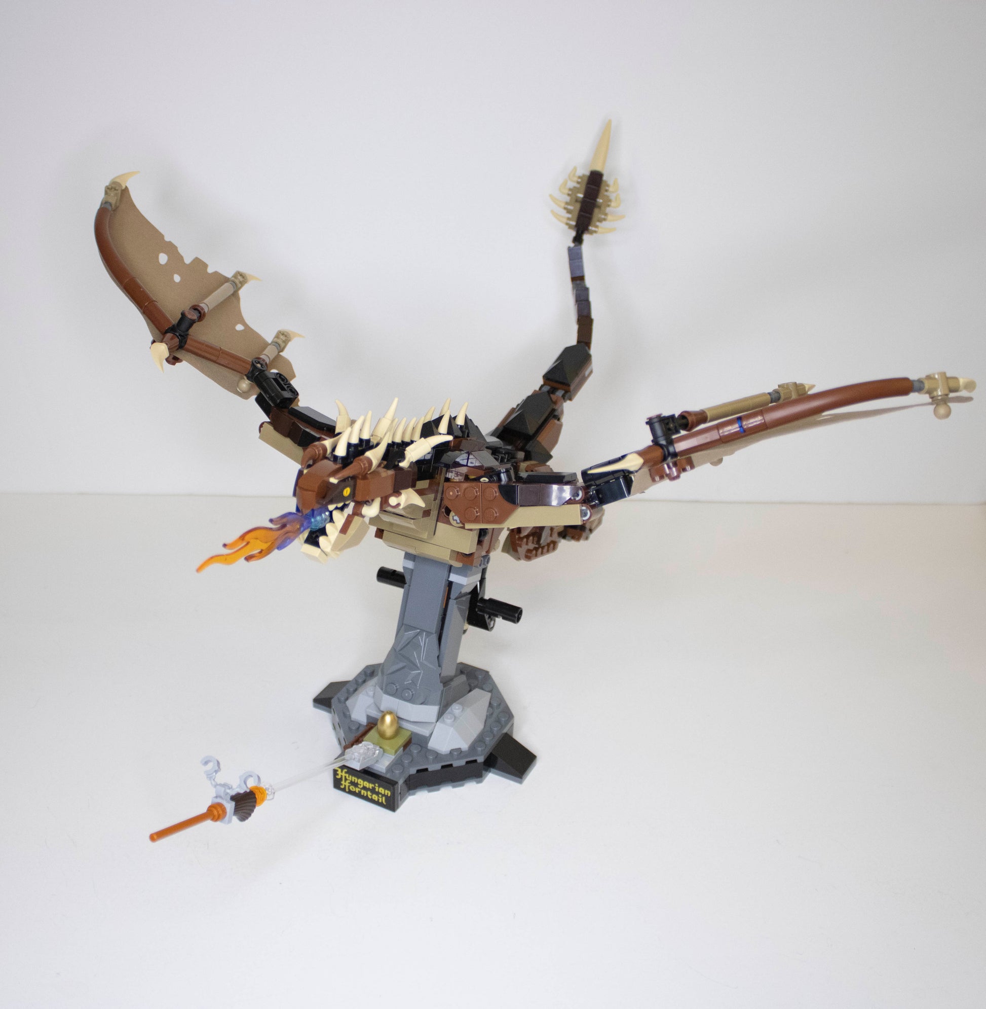 Toy dragon model on a white background
